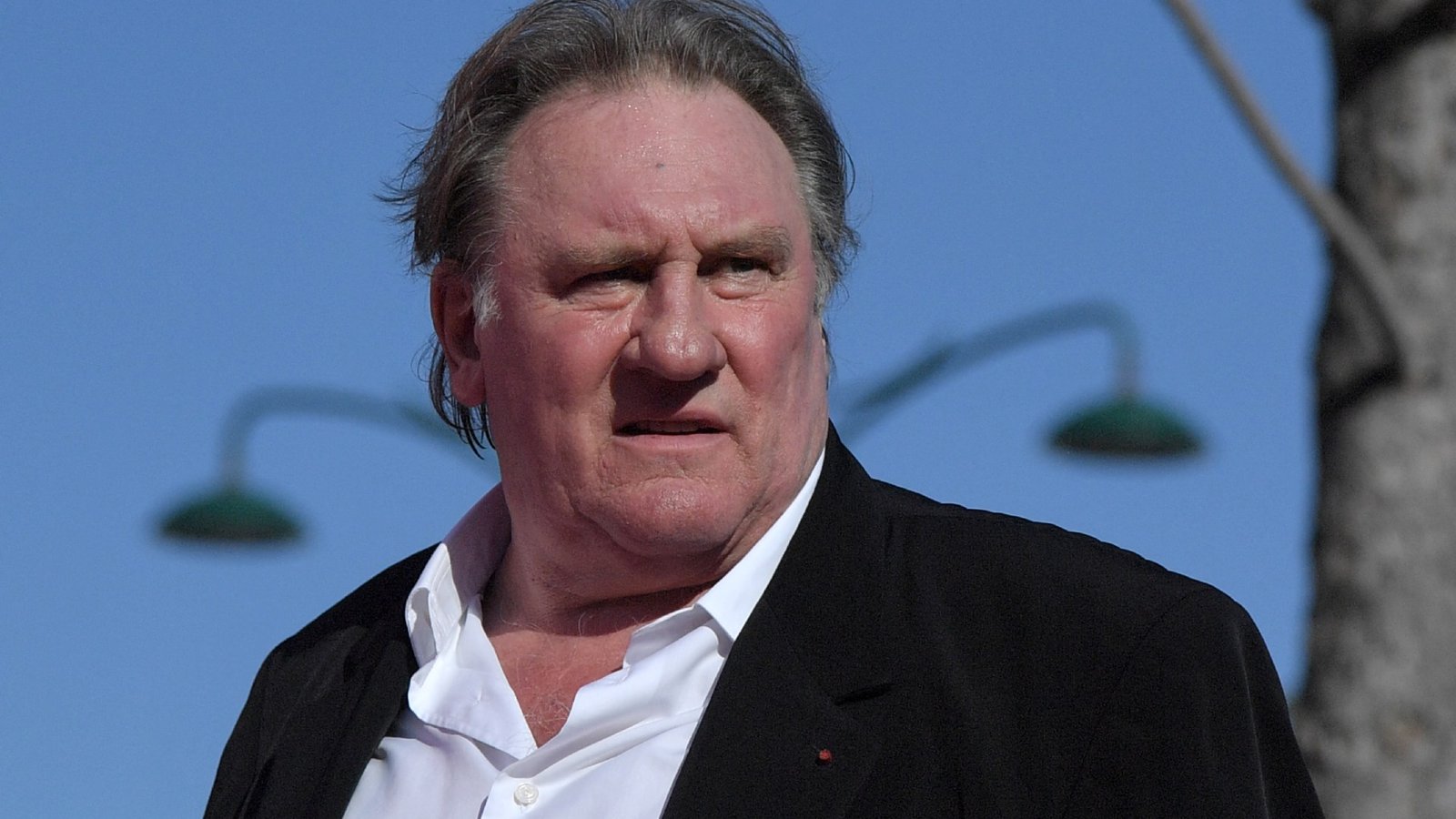 Prosecutors call for French film star Gerard Depardieu to face trial over rape allegations