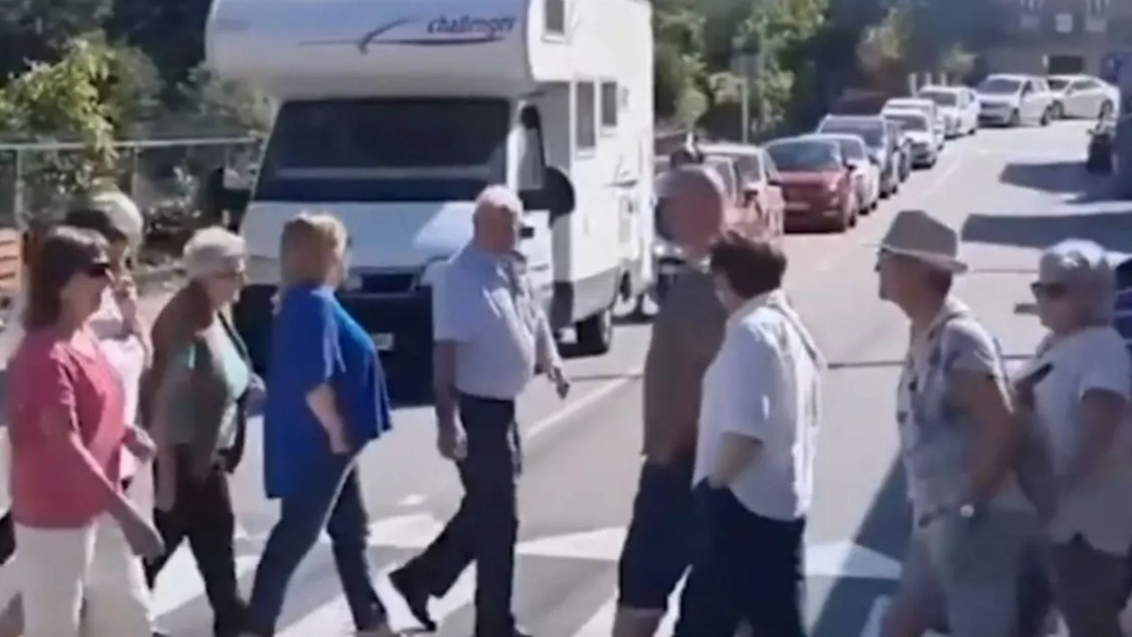 Watch moment anti-tourist campaigners continually use zebra crossing to block beachgoers in most BIZARRE protest yet