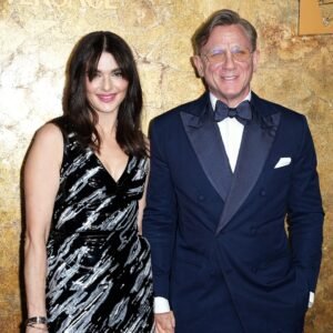 Daniel Craig, Rachel Weisz Turn Heads in Bold Paris Fashion Week Looks