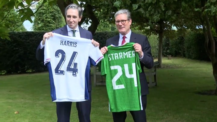 Keir Starmer and Simon Harris trade names on football shirts ahead of England v Ireland