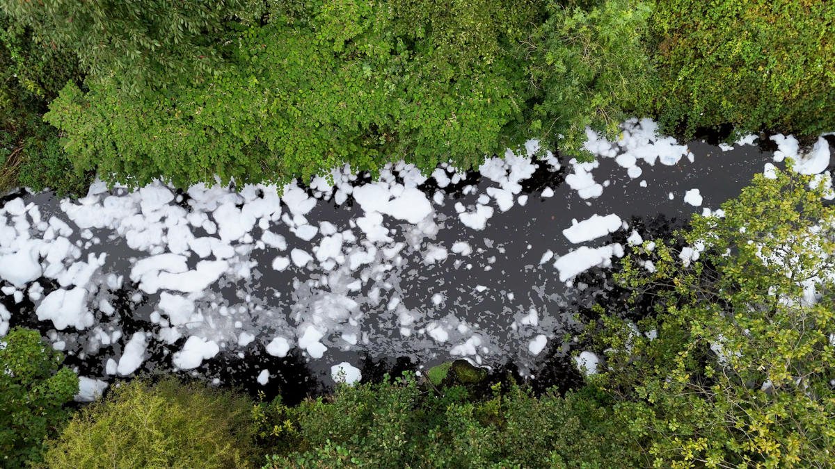 Locals in Greater Manchester town horrified when river starts foaming