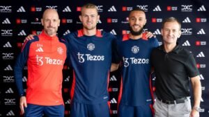 Matthijs de Ligt and Noussair Mazroui are flanked by Erik ten Hag and Dan Ashworth