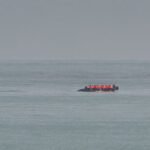 Migrant boat seen trying to make an apparent crossing of English Channel a day after 12 people died