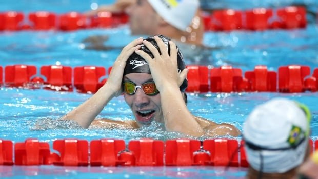 Nicholas Bennett swims to Canada's 1st gold at Paris Paralympics