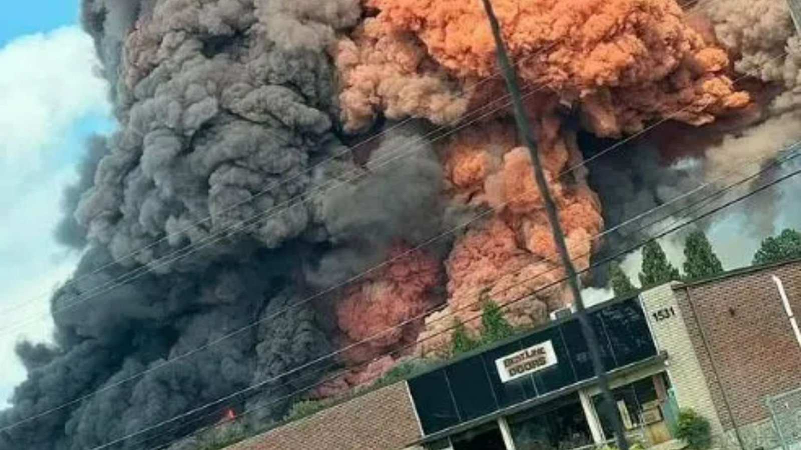 Terrifying moment smoke billows from burning chemical lab as massive fire sparks evacuations