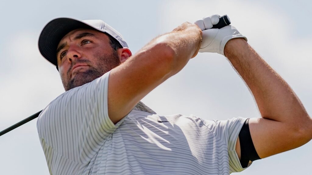 Scottie Scheffler hits his drive from the fourth tee during the third round of the Tour Championship golf tournament, Saturday, Aug. 31, 2024, in Atlanta. (AP Photo/Jason Allen)