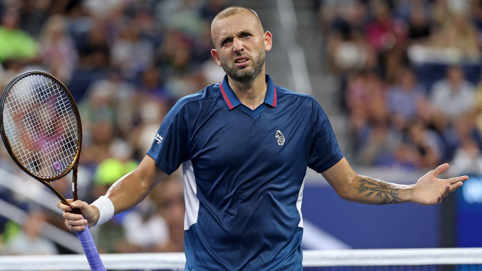 Britain's Dan Evans reacts after a point against Australia's Alex de Minaur during their men's singles third round match on day six of the US Open tennis tournament at the USTA Billie Jean King National Tennis Center in New York City, on August 31, 2024. (Photo by CHARLY TRIBALLEAU / AFP)