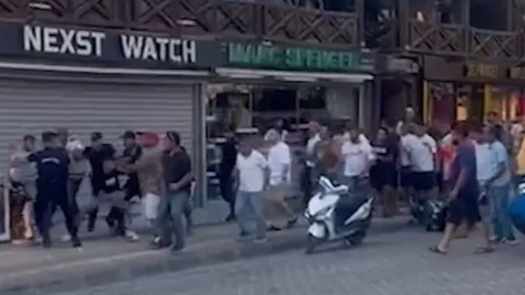 Watch shocking moment mass brawl erupts between knife-wielding thugs in Turkish holiday hotspot forcing Brits to flee