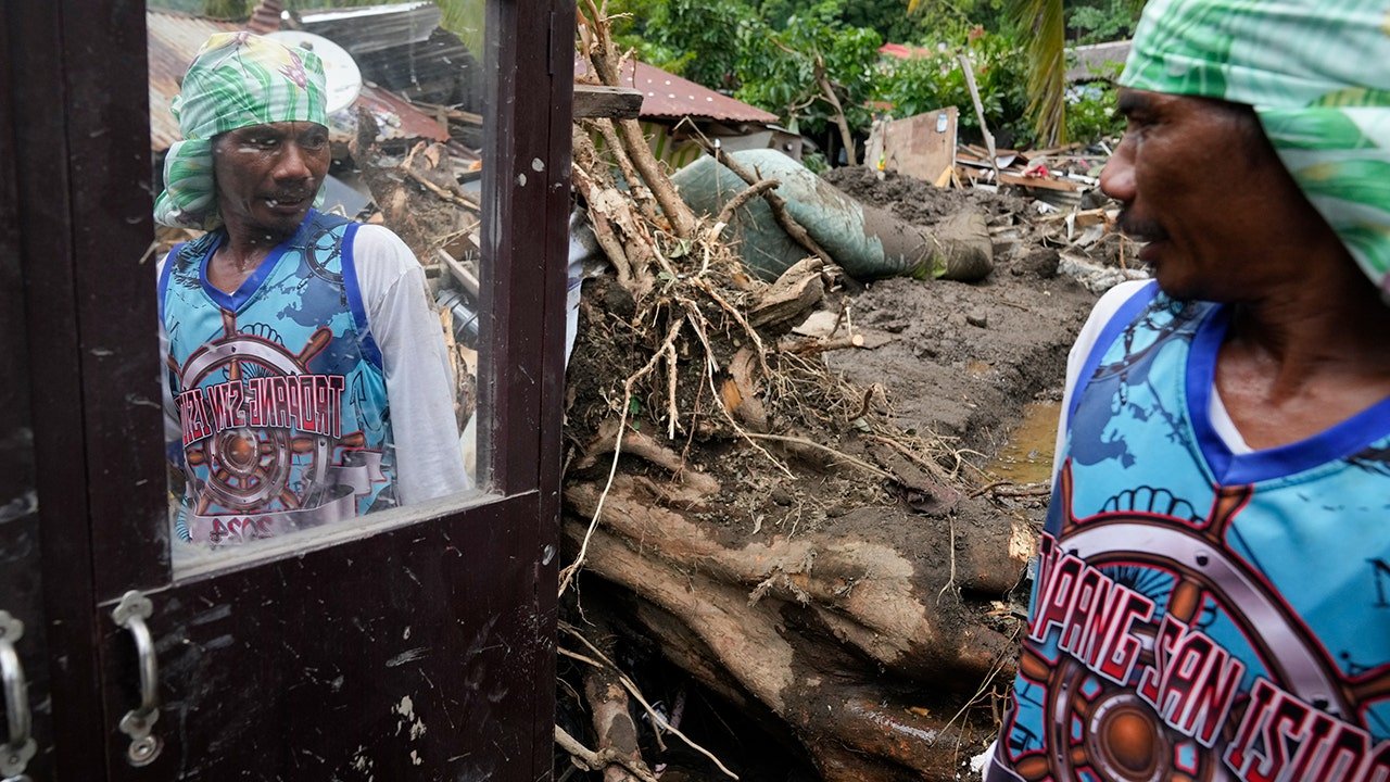 At least 126 dead and missing in massive flooding and landslides in Philippines