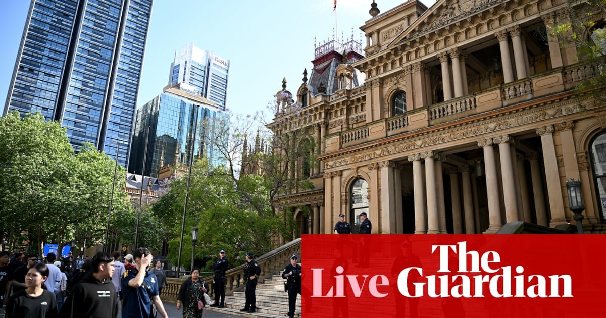 Australia news live: heavy police presence at Sydney town hall for Palestine community vigil; woman, 82, charged over alleged threats to NSW mosque | Australia news