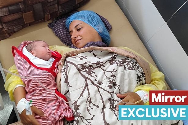 Mum's joy at baby's birth in war-torn Gaza after being pulled from rubble of her home