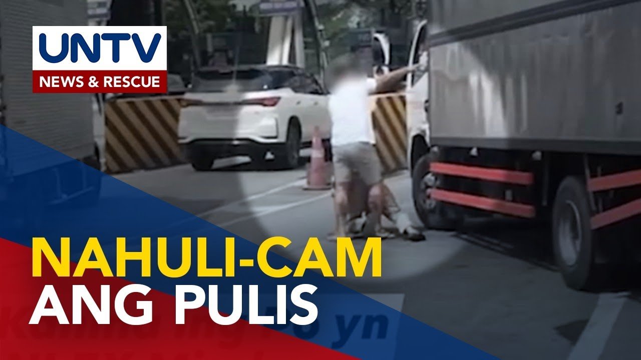 Pulis na nanutok ng baril sa truck driver sa Valenzuela toll plaza, inalis na sa puwesto