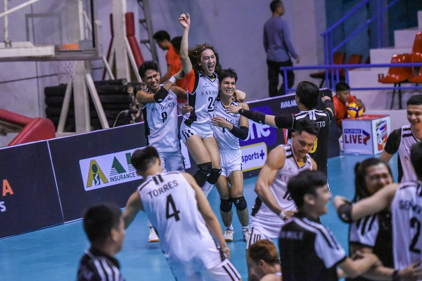 Savouge Spin Doctors celebrate a big win over Cignal HD Spikers in the Spikers’ Turf Invitational Conference.