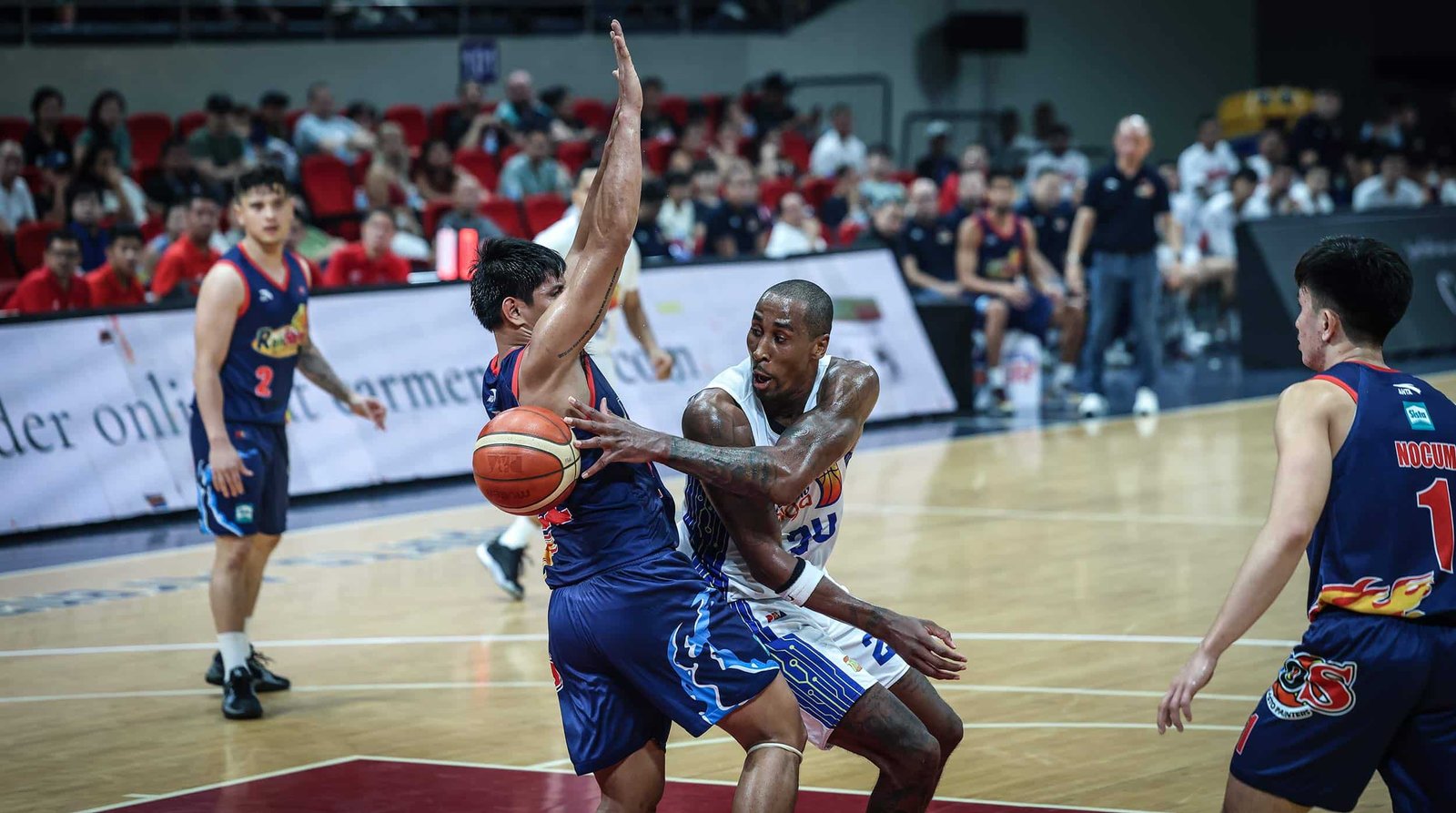 TNT Tropang Giga import Rondae Hollis-Jefferson against Rain or Shine defender during the PBA Governors' Cup semifinals Game 1.