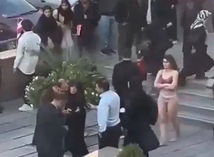 Brave student strips off in Iran to protest strict dress code and is 'violently arrested'