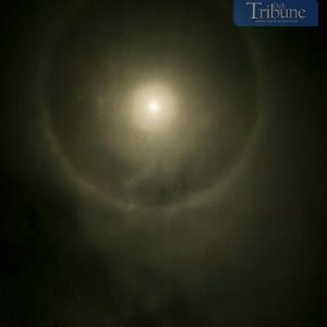 Foreboding night sky: A halo encircles the moon tonight over Olongapo City. This moon halo, a bright ring of light, forms as moonlight refracts throug