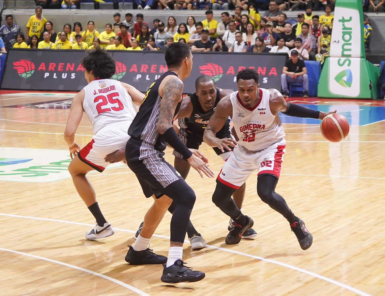 Justin Brownlee (with ball) has been starved to one of his lowest Finals productions for Ginebra.