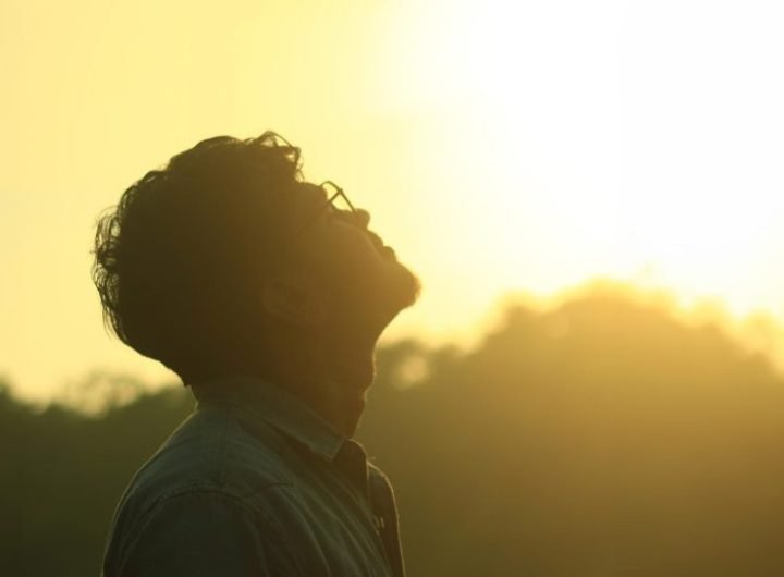 Man Looking Up Outside