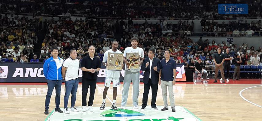 LOOK: San Miguel's June Mar Fajardo claims his 11th PBA Best Player of the Conference award while TNT's Rondae Hollis-Jefferson receives his second Be