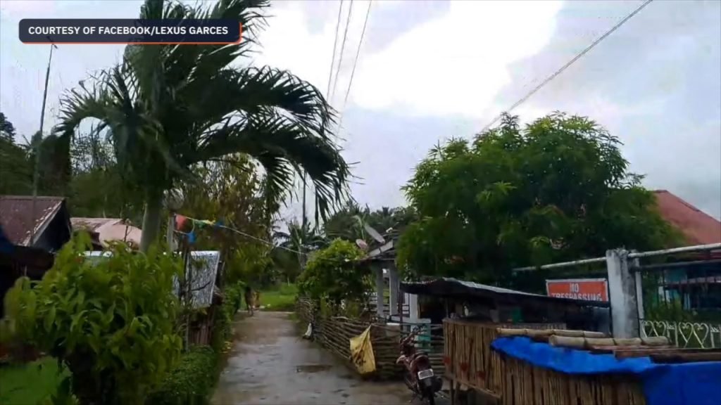 Lexus Garces, resident of Barangay San Rafael, Villareal, Western Samar, takes a video of strong winds in the area as of 9 am on Saturday, November 16