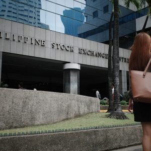 Philippine stocks may be dragged by weak peso