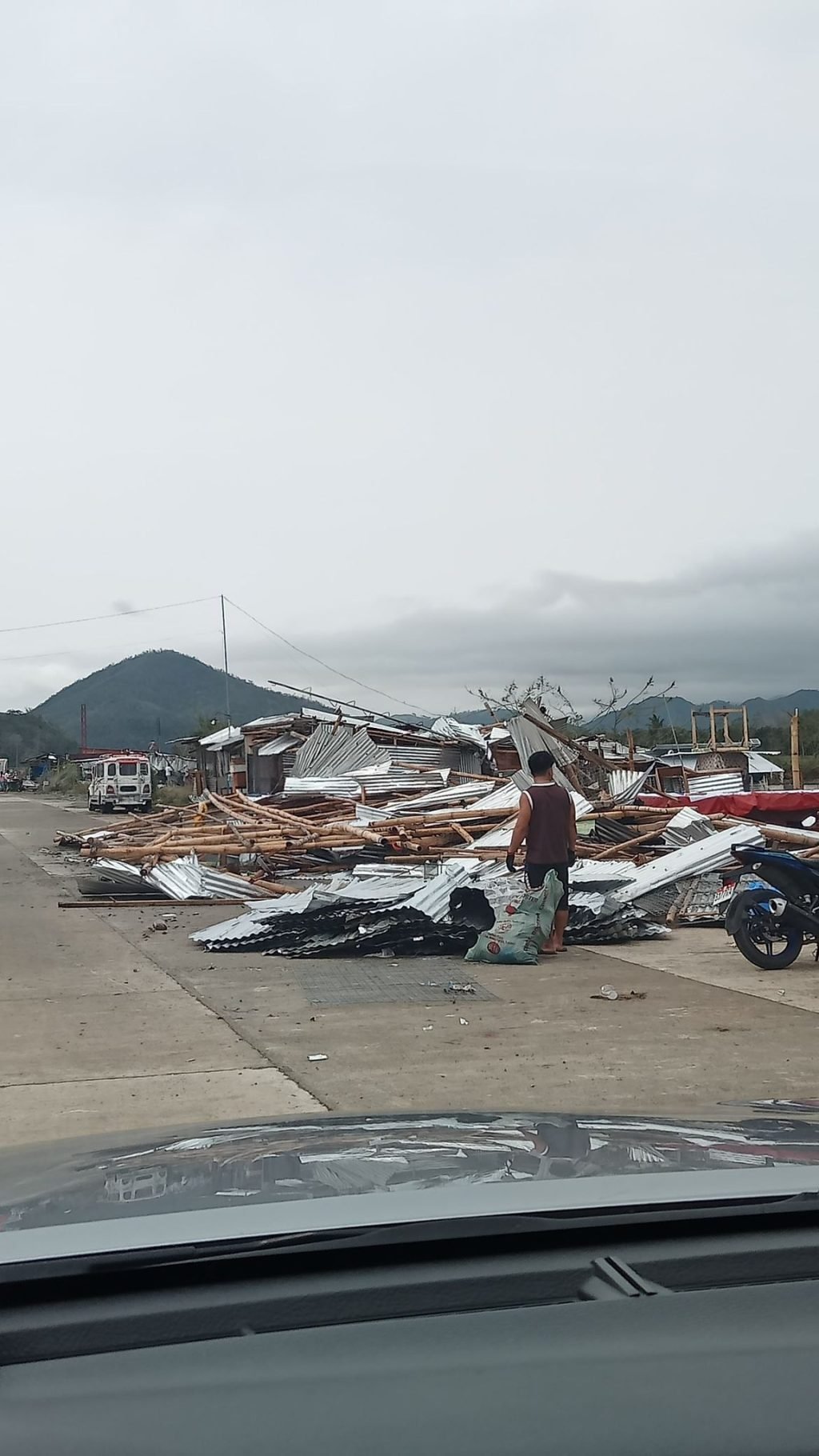 Residents of Barangay Homestead, Bambang, Nueva Vizcaya, face extensive damage to property following the aftermath of Super Typhoon Pepito on Monday,