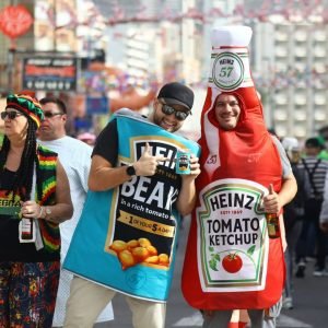 Watch as 30,000 Benidorm Brits take to streets & march in fancy dress to raise funds for horror Spain storm victims