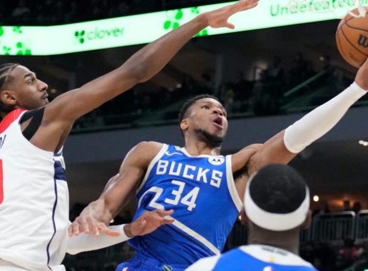 Back after missing one game, Giannis Antetokounmpo records his first career 40-point triple-double as the streaking Bucks pin a 14th straight loss on