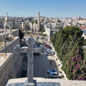 Bethlehem plans somber Christmas under the shadow of war in Gaza. This aerial picture shows the scene at the Manger Square outside the Church of the Nativity in the biblical city of Bethlehem in the occupied West Bank on December 23, 2024.