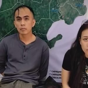 Police Corporal Alfred Dawatan Sabas (left) speaks to reporters at the Magsaysay municipal police station after his shooting rampage in a bus and a police detachment.