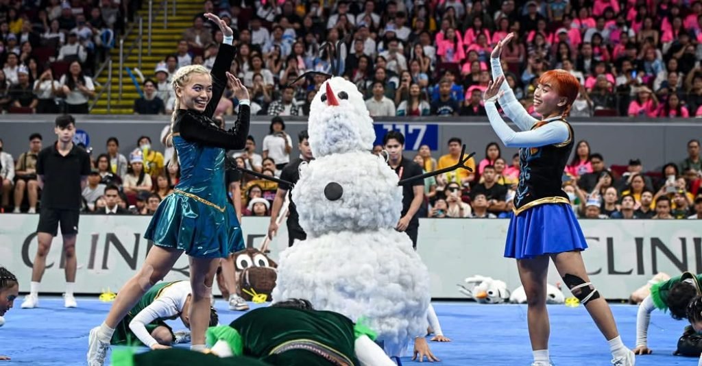 FEU Cheering Squad head coach Randell San Gregorio comes to his team's defense after fans flamed the UAAP Cheerdance Competition results, which put FE