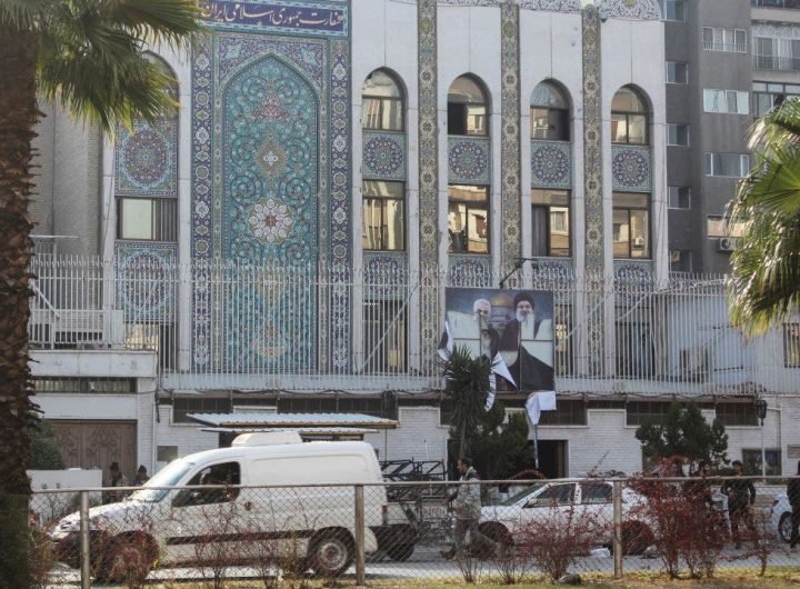 Gunmen storm Iranian embassy in Damascus as Russia claims Assad left 'instructions' to 'transfer power'