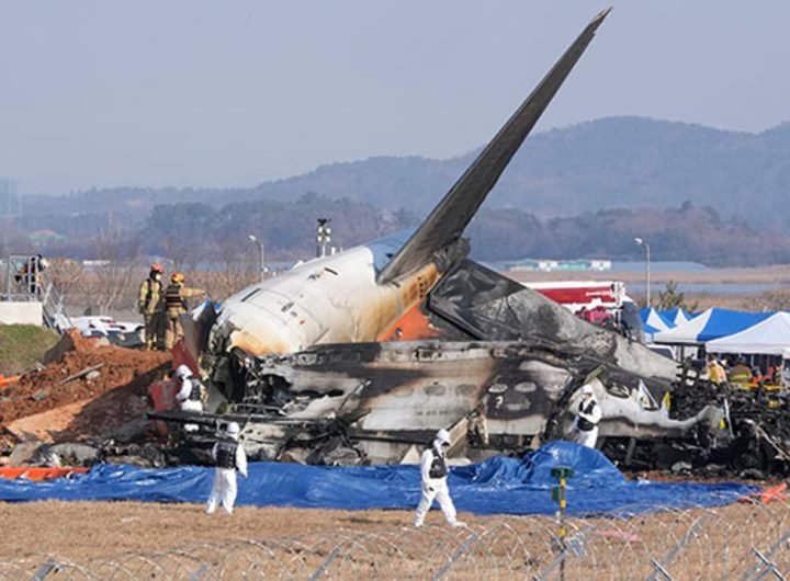 Jetliner skids off runway and bursts into flames, kills 179