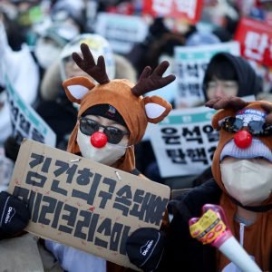 Protesters participate in a rally calling for the impeachment of South Korean President Yoon Suk-yeol in front of the National Assembly in Seoul, Sout