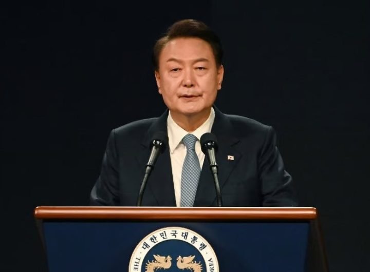 South Korea's Justice Ministry said Monday it imposed a travel ban on President Yoon Suk Yeol as police investigate him for insurrection over his cont