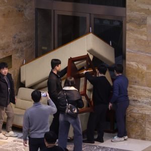 South Korea's main opposition Democratic Party's staff set up a barricade to block soldiers at the National Assembly in Seoul, South Korea, after Sout