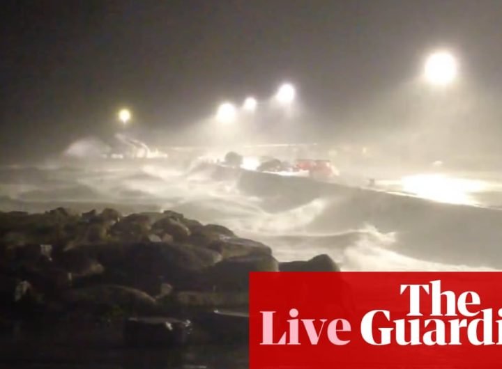 Storm Darragh live: millions in UK told to stay home amid rare red ‘danger to life’ warning | UK weather