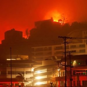 An environment researcher says that as long as areas that were once natural vegetation are transformed into commercial developments, wildfires will co