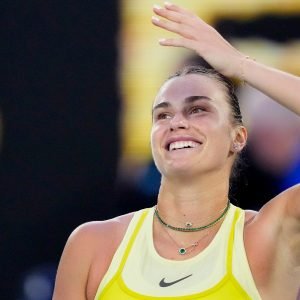 Aryna Sabalenka of Belarus reacts after defeating Sloane Stephens of the U.S. in their first round match at the Australian Open tennis championship in Melbourne, Australia, Sunday, Jan. 12, 2025. (AP Photo/Vincent Thian)