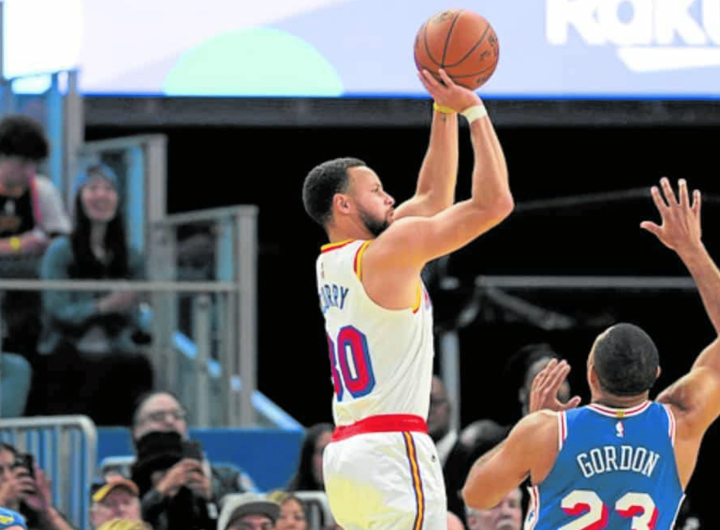 Steph Curry (left) drains one of his eight triples in leading the Warriors to a rout of the Sixers.