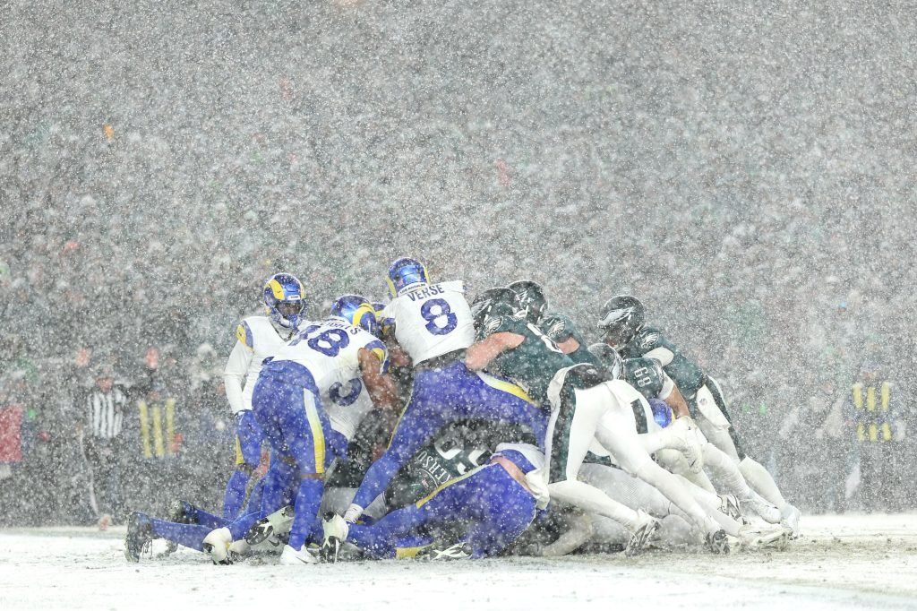 Jayden Daniels and Terry McLaurin smile after beating the Lions in the divisional round.