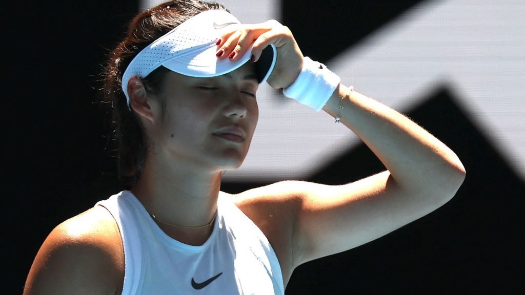 Britain's Emma Raducanu reacts on a point against Poland's Iga Swiatek during their women's singles match on day seven of the Australian Open tennis tournament in Melbourne on January 18, 2025. (Photo by DAVID GRAY / AFP) / -- IMAGE RESTRICTED TO EDITORIAL USE - STRICTLY NO COMMERCIAL USE --