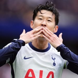 Heung-Min Son celebrates after capitalising on a Jordan Pickford error to double Spurs' lead over Everton