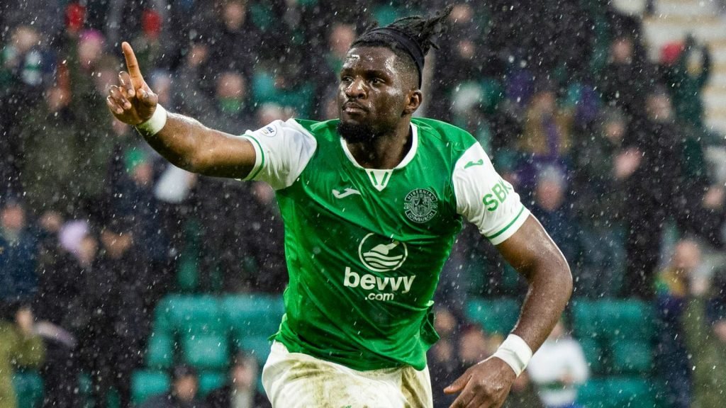 Hibernian's Rocky Bushiri celebrates scoring to make it 3-3