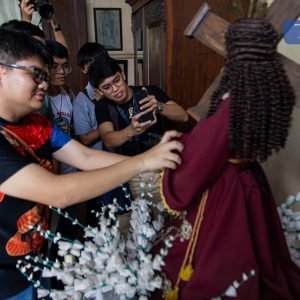 LOOK: Visitors view a replica wooden sculpture of Jesus Nazareno on display at Bahay Nakpil-Bautista in Manila on Sunday.