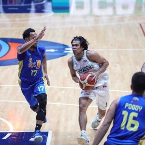 Mark Nonoy drives past Jayson Castro during a game between TNT Tropang Giga and Terrafirma Dyip in the PBA Commissioner's Cup.