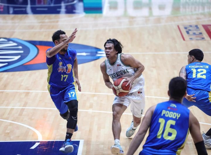 Mark Nonoy drives past Jayson Castro during a game between TNT Tropang Giga and Terrafirma Dyip in the PBA Commissioner's Cup.