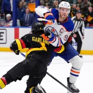 McDavid to have NHL hearing for cross-check to head of Canucks' Garland