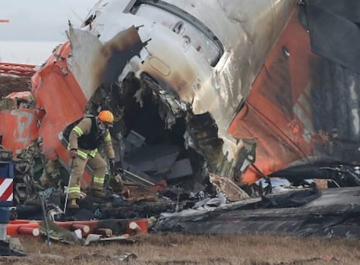 South Korea police raid Jeju Air, airport operator over fatal plane crash