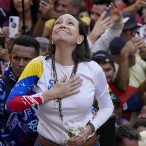 Venezuela’s opposition leader defies Maduro to lead protests that end in confusing arrest claims